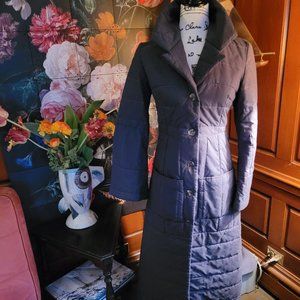 Paris designer Patricia Louisor maxi coat with high color and high back slit